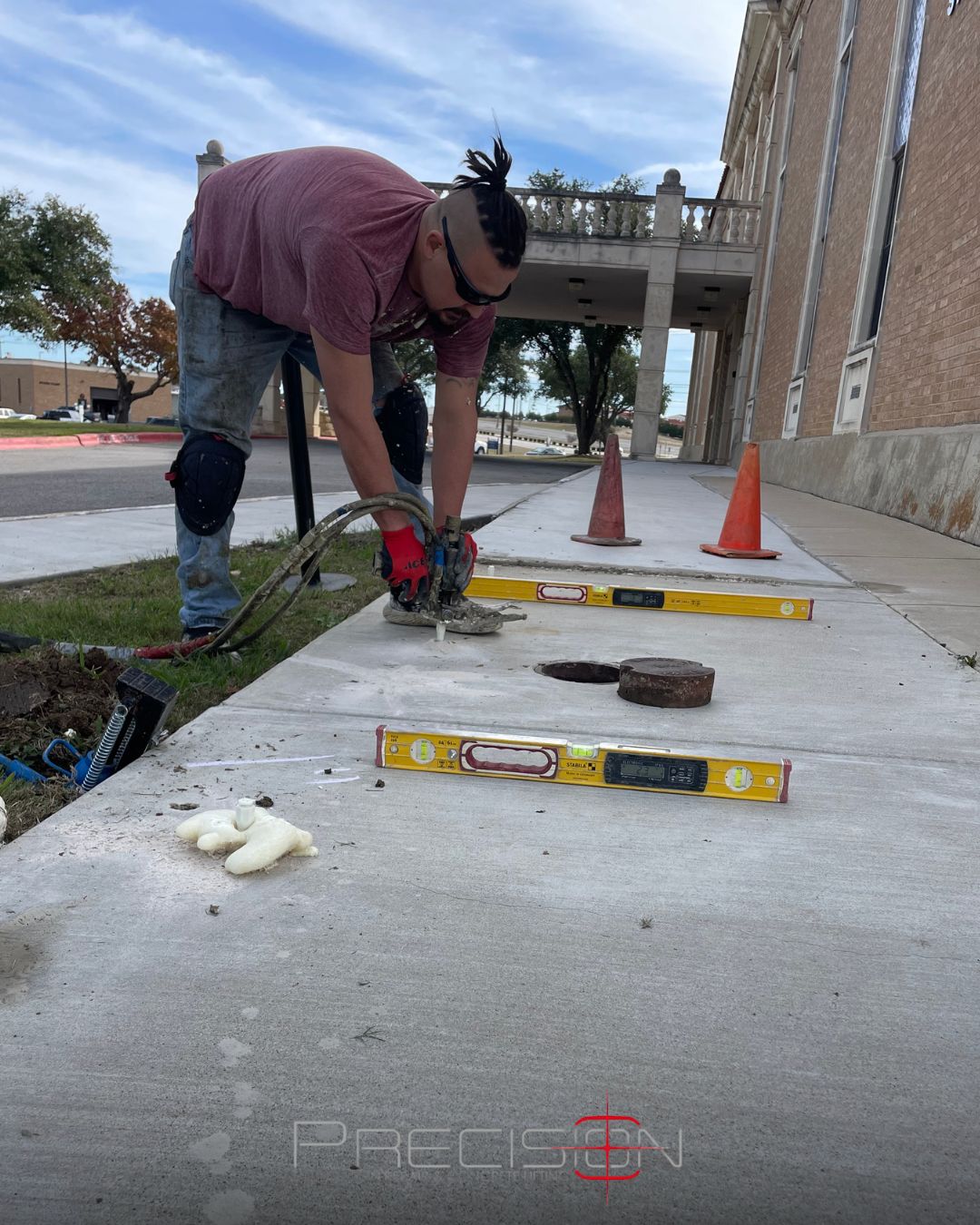 Polyurethane foam being injected into small ports to lift a sunken residential concrete walkway in Comanche, Comanche County, Texas. Polyurethane foam being injected into small ports to lift a sunken residential concrete walkway in Comanche, Comanche County, Texas.