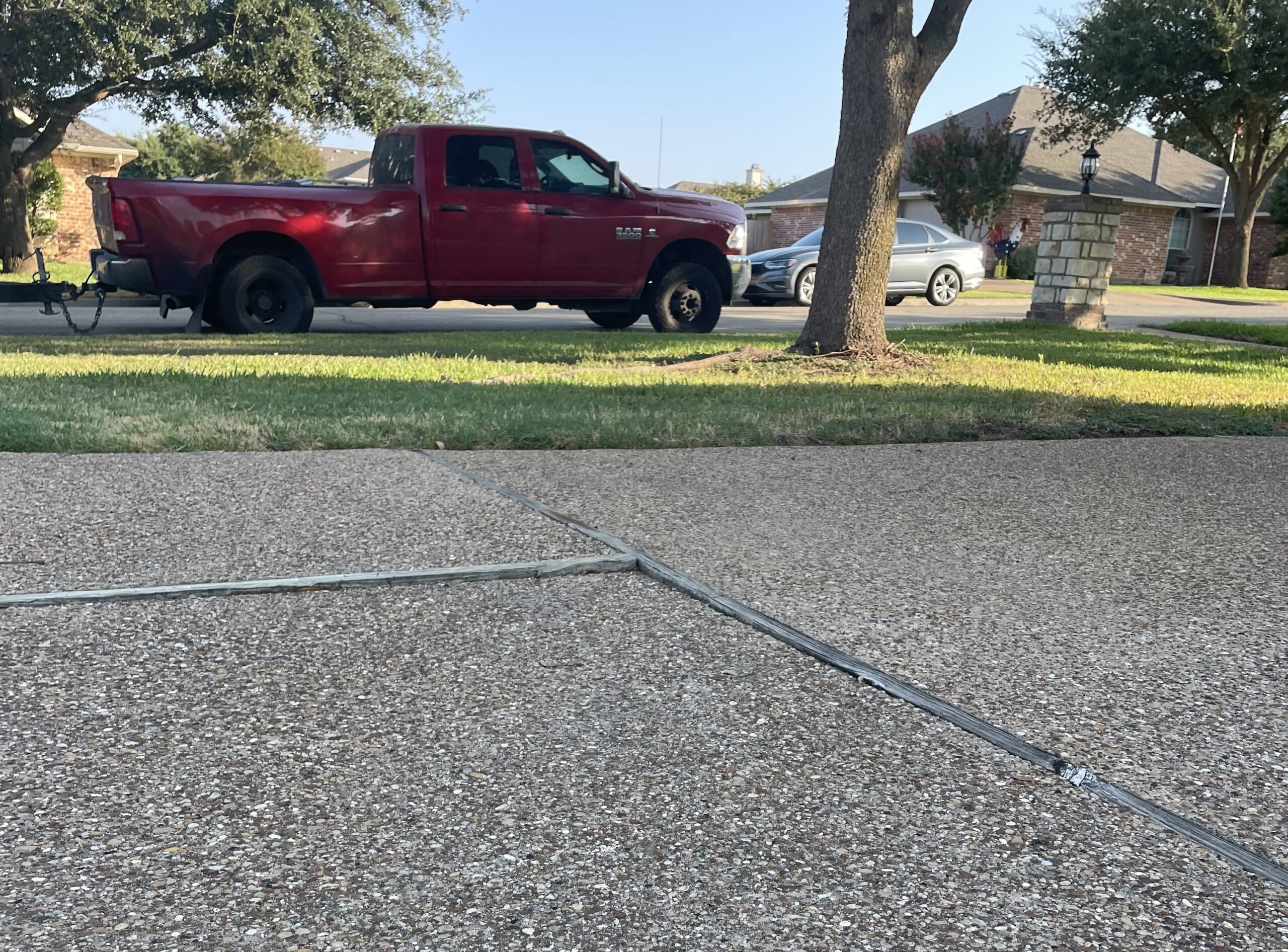 Precision Foundation Repair crew using polyurethane foam injection to lift a sinking concrete driveway in Stephenville, Texas. Precision Foundation Repair crew using polyurethane foam injection to lift a sinking concrete driveway in Stephenville, Texas.